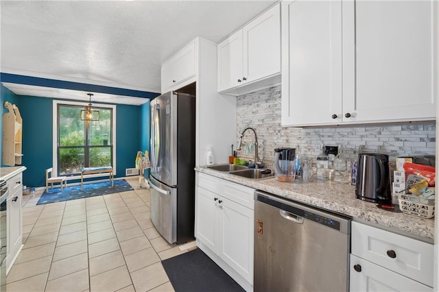 5360 Fieldgreen Dr, Stone Mountain, GA 30088 - kitchen with stainless steel appliances, light tile patterned floors, backsplash, and white cabinetry