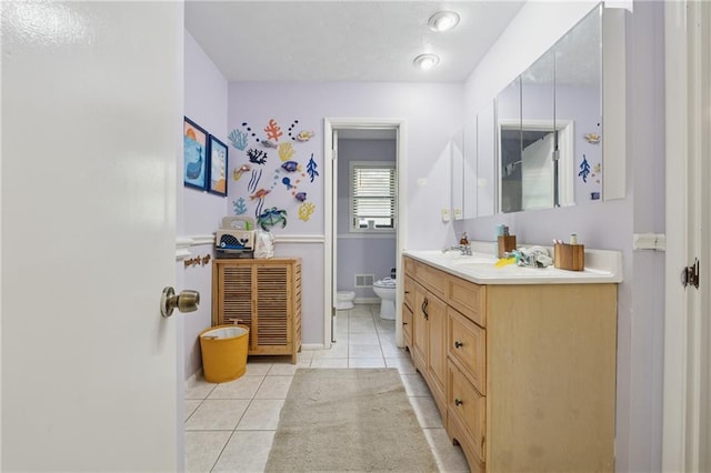 5360 Fieldgreen Dr, Stone Mountain, GA 30088 - bathroom with a bidet, tile patterned flooring, and vanity