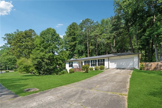 5360 Fieldgreen Dr, Stone Mountain, GA 30088 - view of front of property featuring a garage, a front lawn, and driveway