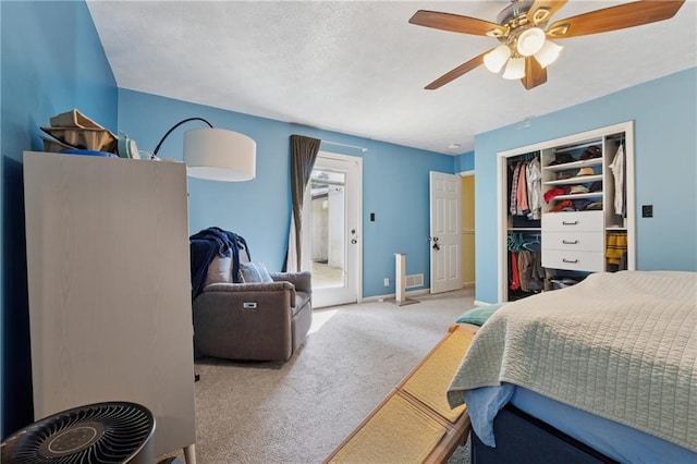 5360 Fieldgreen Dr, Stone Mountain, GA 30088 - bedroom featuring carpet, a closet, and ceiling fan