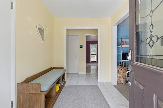 5360 Fieldgreen Dr, Stone Mountain, GA 30088 - mudroom featuring light tile patterned floors and baseboards