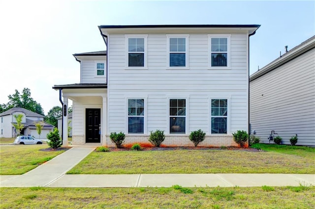 view of front of house featuring a front yard