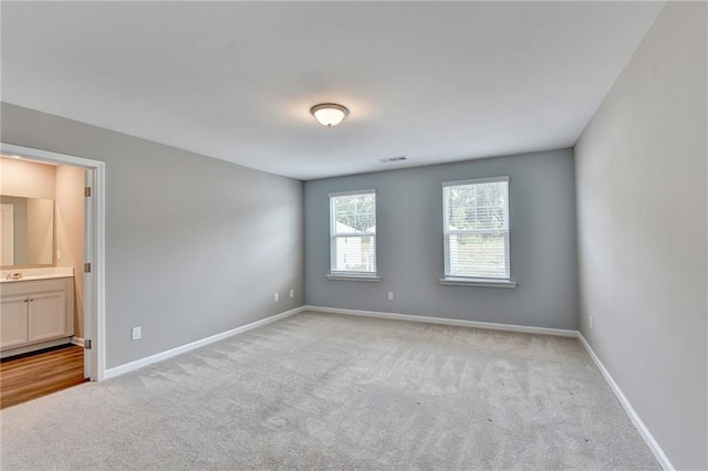 view of carpeted spare room