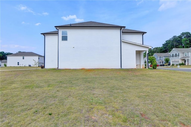 view of property exterior featuring a lawn