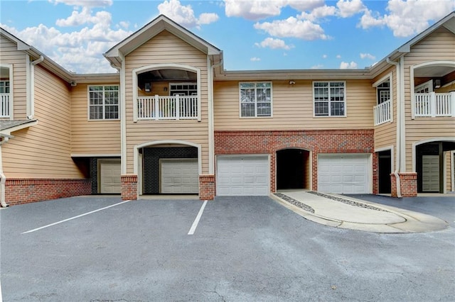 3500 Sweetwater Rd Unit 522, Duluth, GA 30096 - view of building exterior with a garage