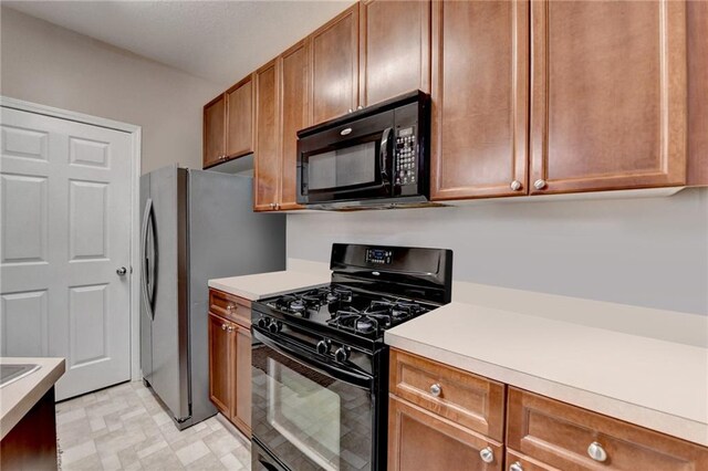 3500 Sweetwater Rd Unit 522, Duluth, GA 30096 - view of asphalt street featuring a gate, a gated entry, and curbs