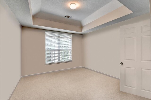 3500 Sweetwater Rd Unit 522, Duluth, GA 30096 - empty room with a tray ceiling, carpet floors, a textured ceiling, and baseboards