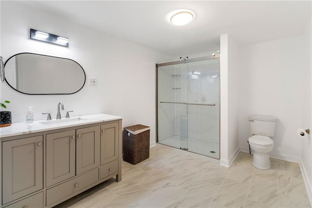 bathroom with walk in shower, vanity, and toilet