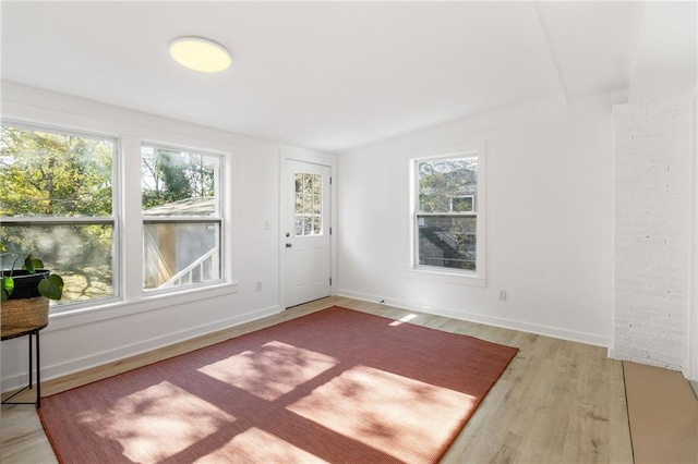 spare room featuring light hardwood / wood-style flooring