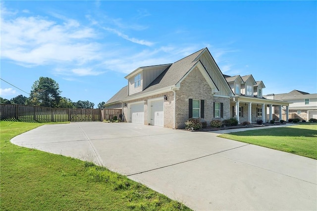 view of home's exterior featuring a garage and a yard