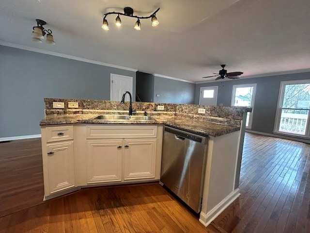 kitchen with white cabinets, ceiling fan, dark wood-type flooring, sink, and dishwasher