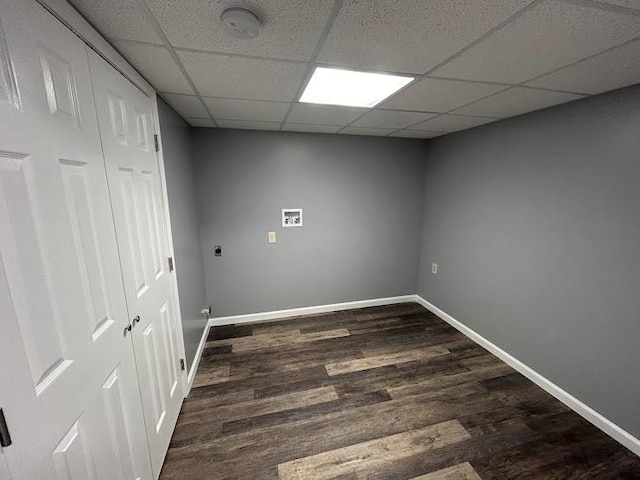 laundry room featuring dark wood-type flooring and hookup for an electric dryer