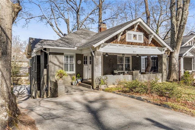 craftsman-style home featuring covered porch