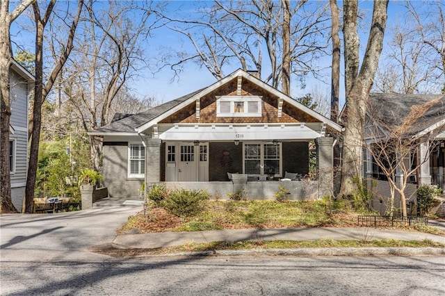 bungalow featuring covered porch