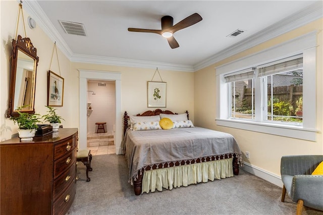 carpeted bedroom featuring crown molding and ceiling fan