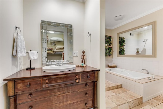 bathroom with vanity, crown molding, tile patterned floors, and a relaxing tiled tub