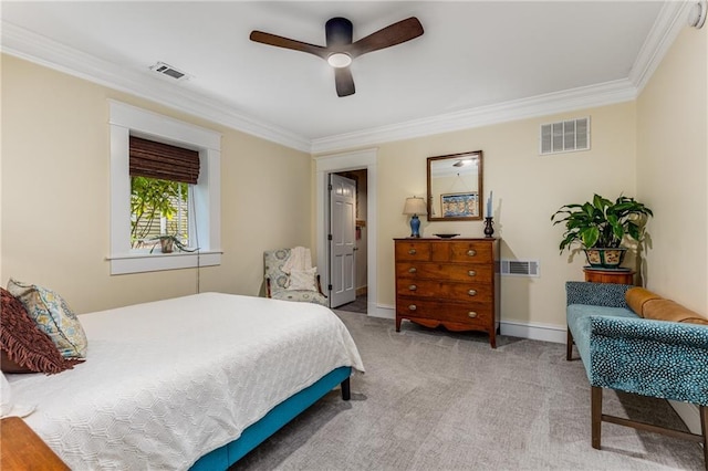 bedroom with crown molding, ceiling fan, and light carpet