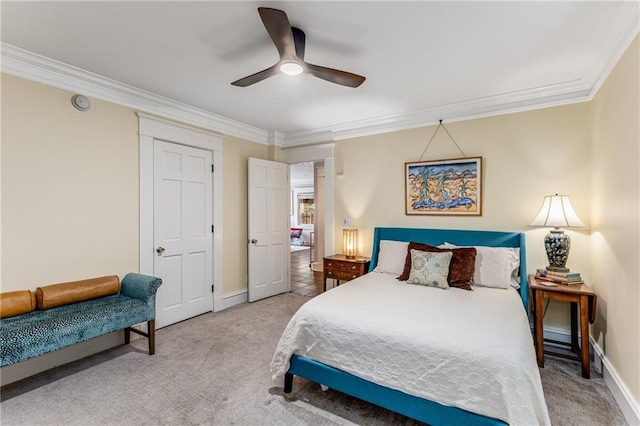 bedroom with ceiling fan, light colored carpet, and ornamental molding