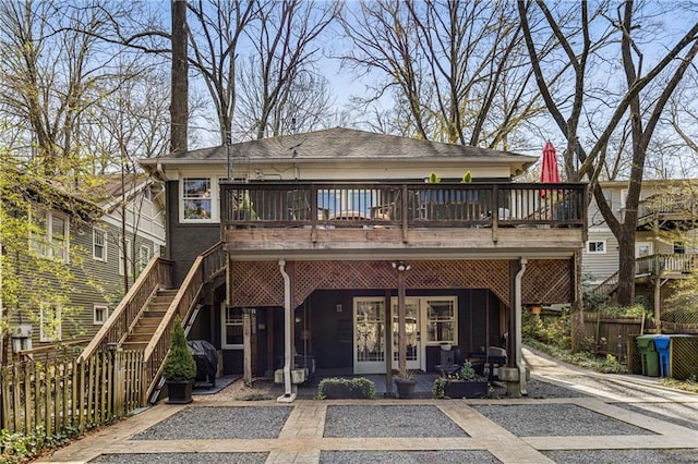 rear view of property with a deck