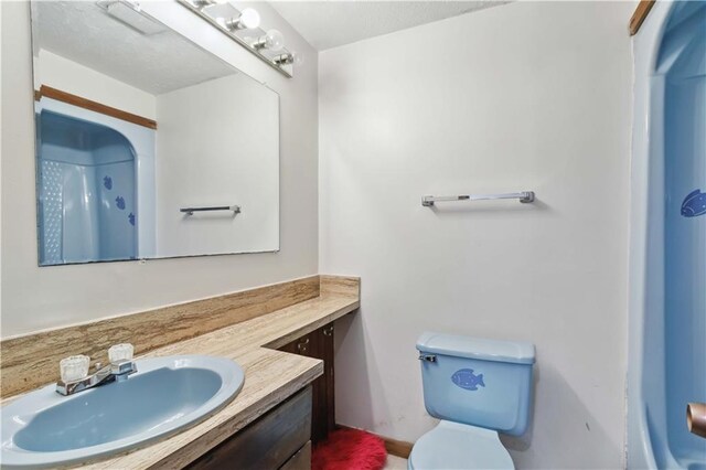 2125 Datona Dr SW, Atlanta, GA 30331 - bathroom featuring vanity, toilet, and a shower