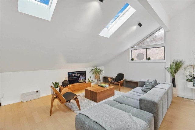 2125 Datona Dr SW, Atlanta, GA 30331 - living area with a skylight, lofted ceiling, and light wood-style floors