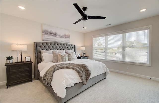 bedroom with visible vents, a ceiling fan, recessed lighting, baseboards, and light colored carpet