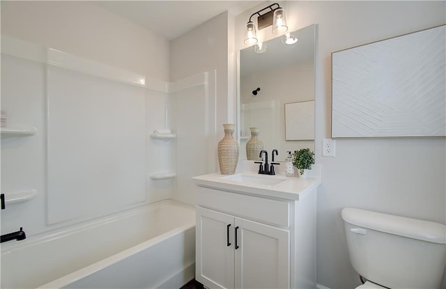 full bathroom featuring vanity, shower / bathing tub combination, and toilet