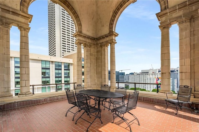 75 Ponce De Leon Ave NE Unit 1006, Atlanta, GA 30308 - view of patio with a city view and outdoor dining space