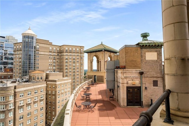 75 Ponce De Leon Ave NE Unit 1006, Atlanta, GA 30308 - view of patio / terrace with french doors and a city view