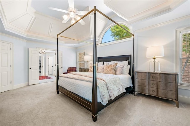 carpeted bedroom featuring multiple windows, ornamental molding, and baseboards