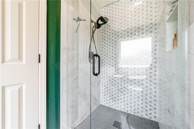 bathroom featuring a shower stall