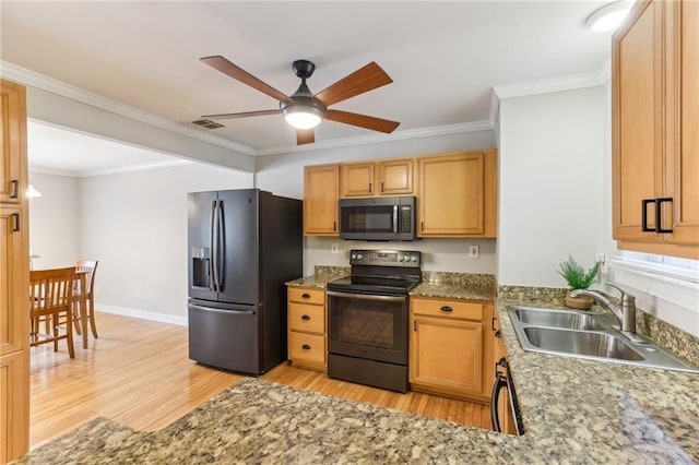 kitchen featuring black range with electric cooktop, a sink, refrigerator with ice dispenser, and crown molding