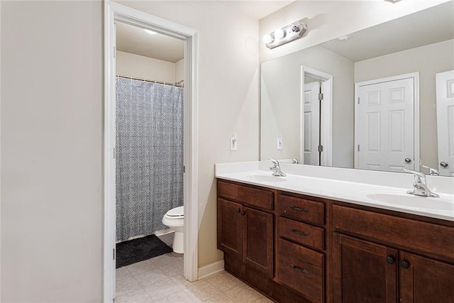 1110 Cureton Dr, Austell, GA 30106 - full bathroom featuring toilet and double vanity