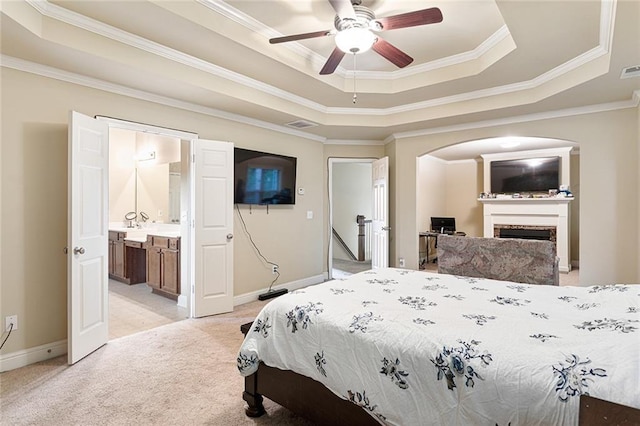 1110 Cureton Dr, Austell, GA 30106 - bedroom with a raised ceiling, ornamental molding, light colored carpet, a fireplace, and baseboards