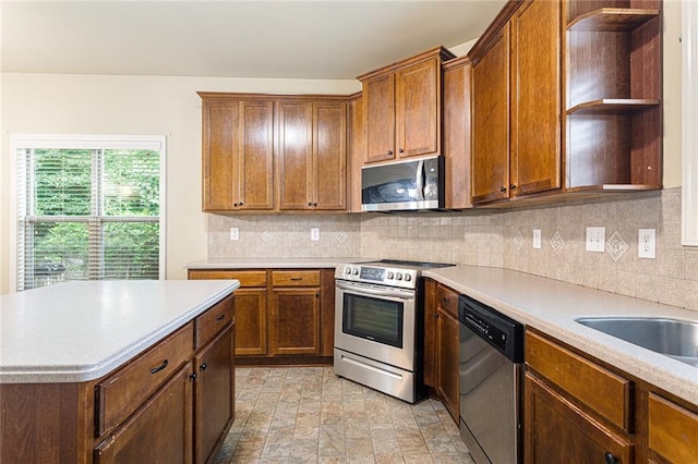 1110 Cureton Dr, Austell, GA 30106 - kitchen with stainless steel appliances, open shelves, light countertops, and decorative backsplash