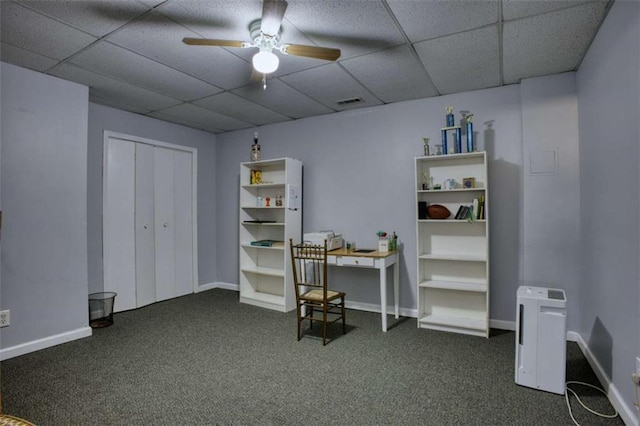 9600 Poplar Ct, Douglasville, GA 30135 - office featuring dark colored carpet, ceiling fan, a drop ceiling, and baseboards