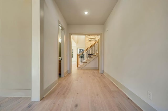 corridor featuring light wood-type flooring