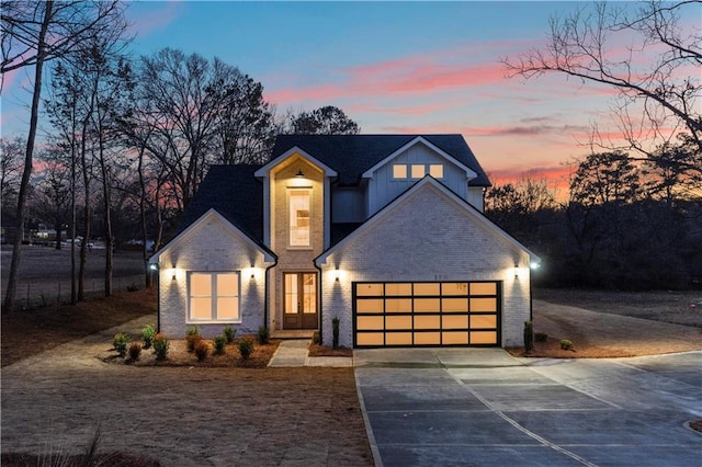 view of front of property with a garage