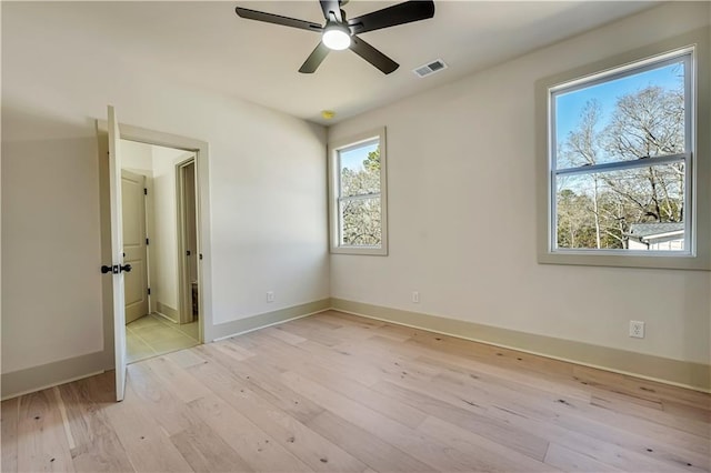 unfurnished bedroom featuring light wood-type flooring and ceiling fan
