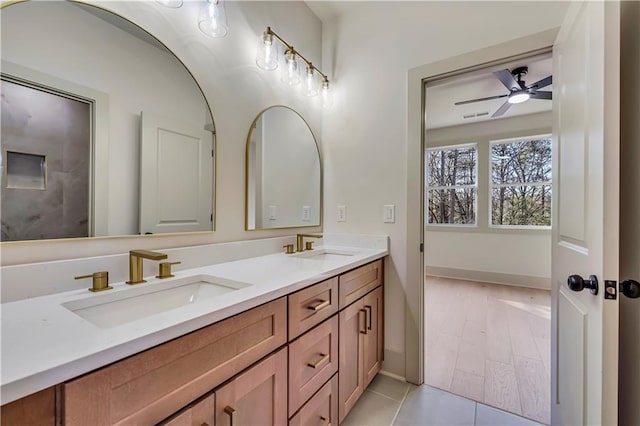 bathroom with vanity, tile patterned floors, and ceiling fan