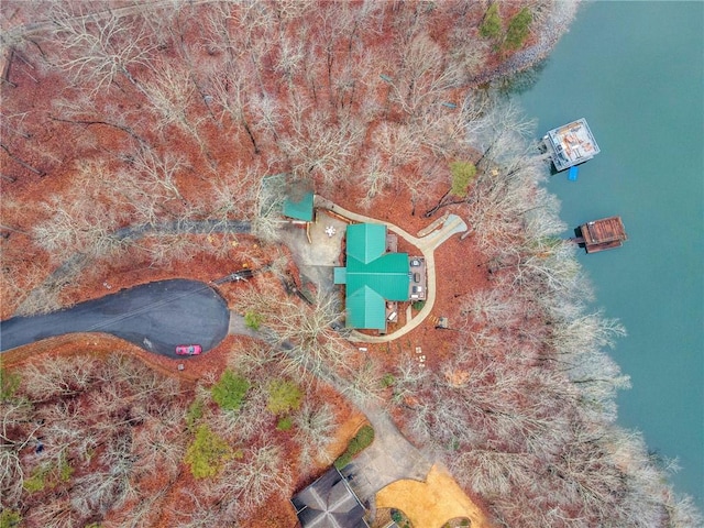 birds eye view of property featuring a water view