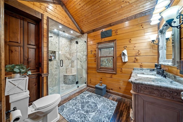 bathroom featuring walk in shower, lofted ceiling, toilet, wood walls, and vanity