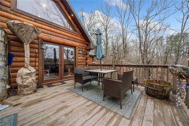 wooden terrace featuring french doors