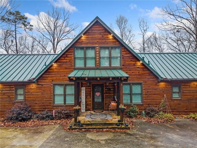 view of log cabin