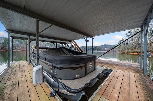 dock area featuring a water view