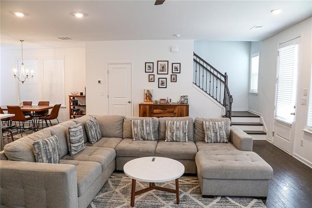 4734 Dewitt Dr, Duluth, GA 30097 - living area with a chandelier, stairway, dark wood finished floors, recessed lighting, and baseboards