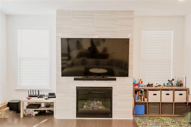 4734 Dewitt Dr, Duluth, GA 30097 - detailed view of wood finished floors and a tiled fireplace