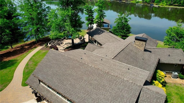 drone / aerial view featuring a water view