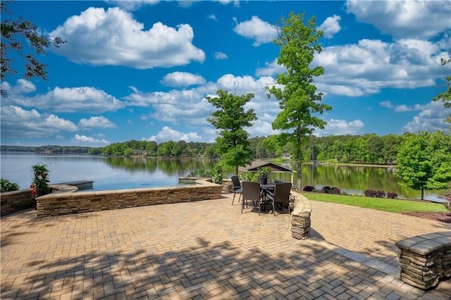 view of patio featuring a water view