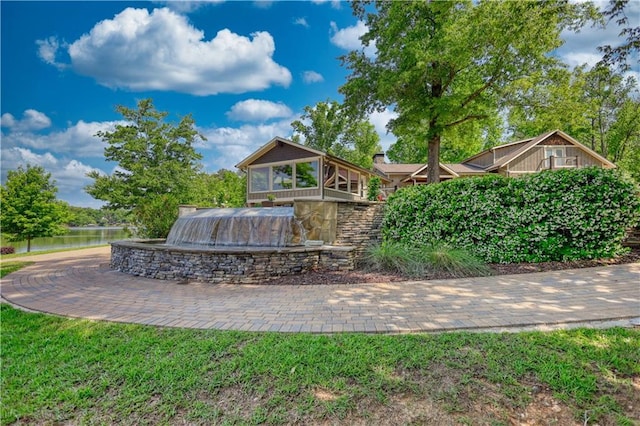 exterior space with a water view
